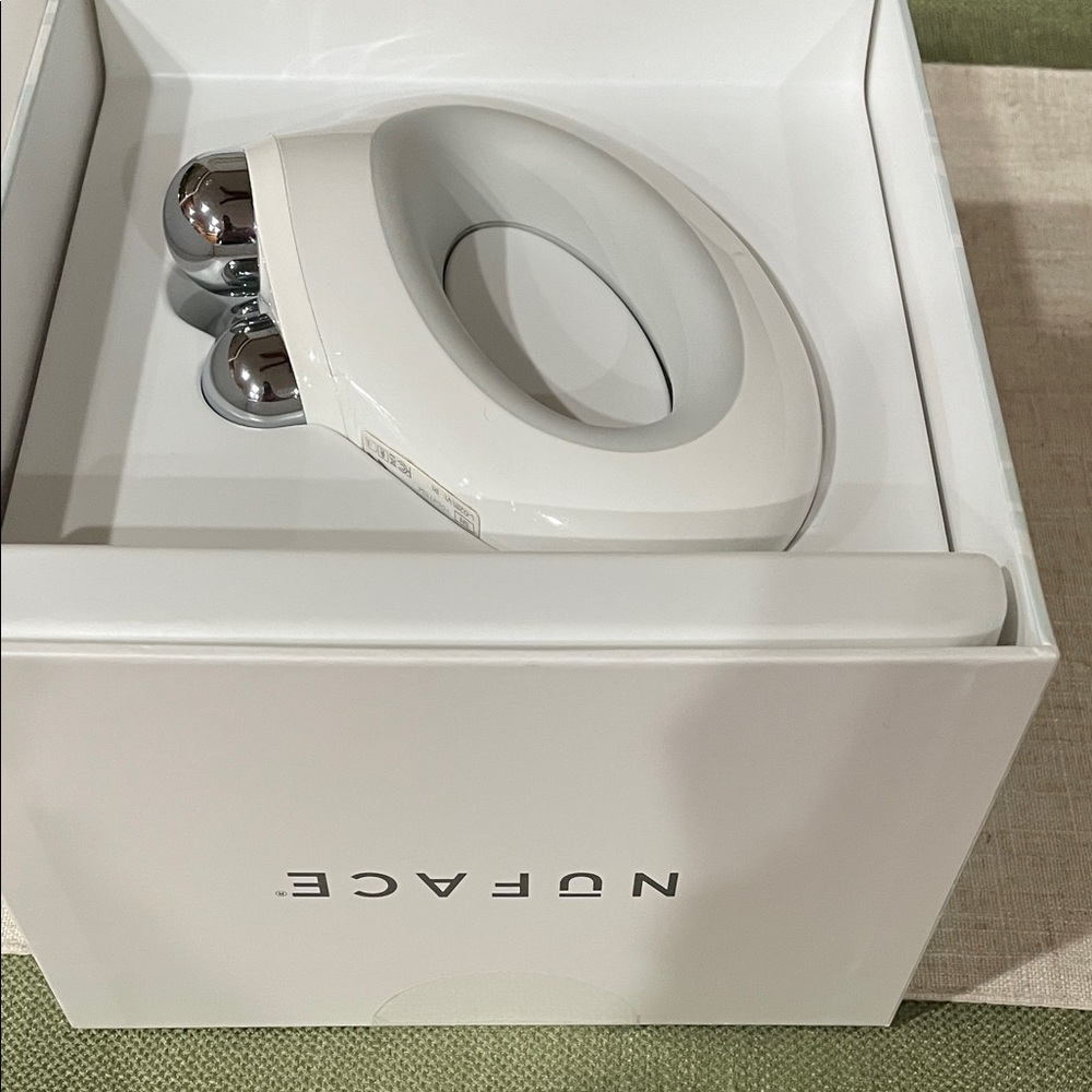 NuFace NuBody Silver and White Body Toning Device